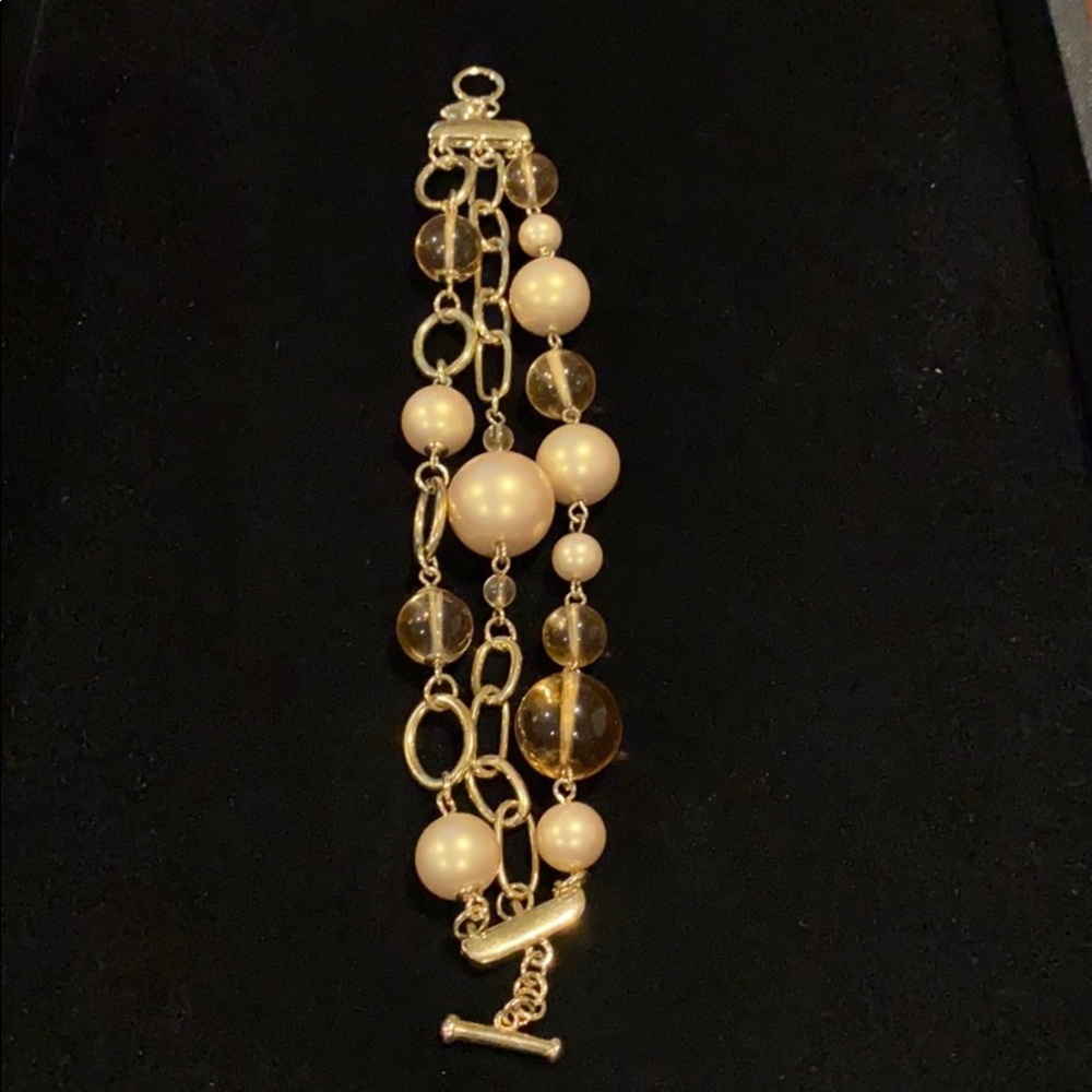Carolee faux pearl triple strand toggle bracelet